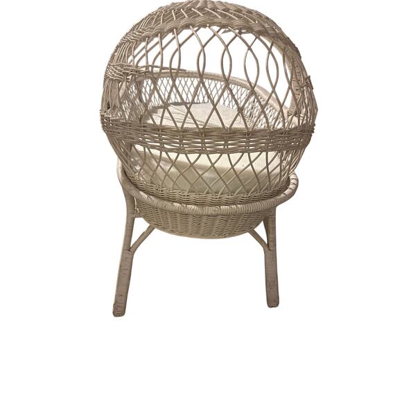 wicker bassinet, likely a Pottery Barn Kids 

complete with a mattress pad. - Picture 1 of 16